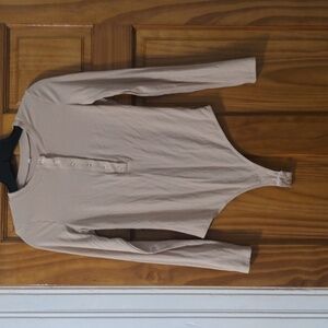 Size Small tan color long sleeve bodysuit